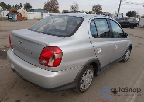 2000 Toyota Echo z USA, uszkodzony, nr VIN JTDBT1239Y5020095
